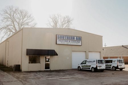Southern Air Heating & Cooling commercial building with service vehicles parked outside in Monroe.